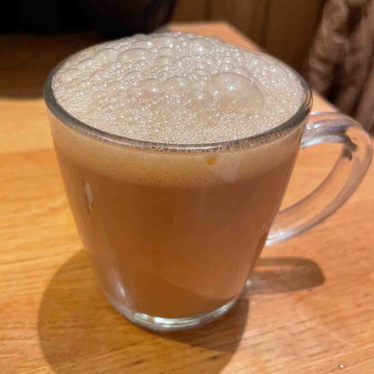 frothy malaysian pulled tea with condensed milk
