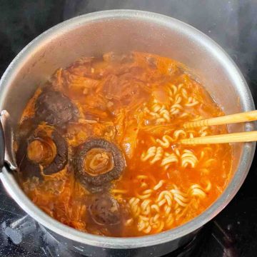 add ramen noodles to kimchi soup
