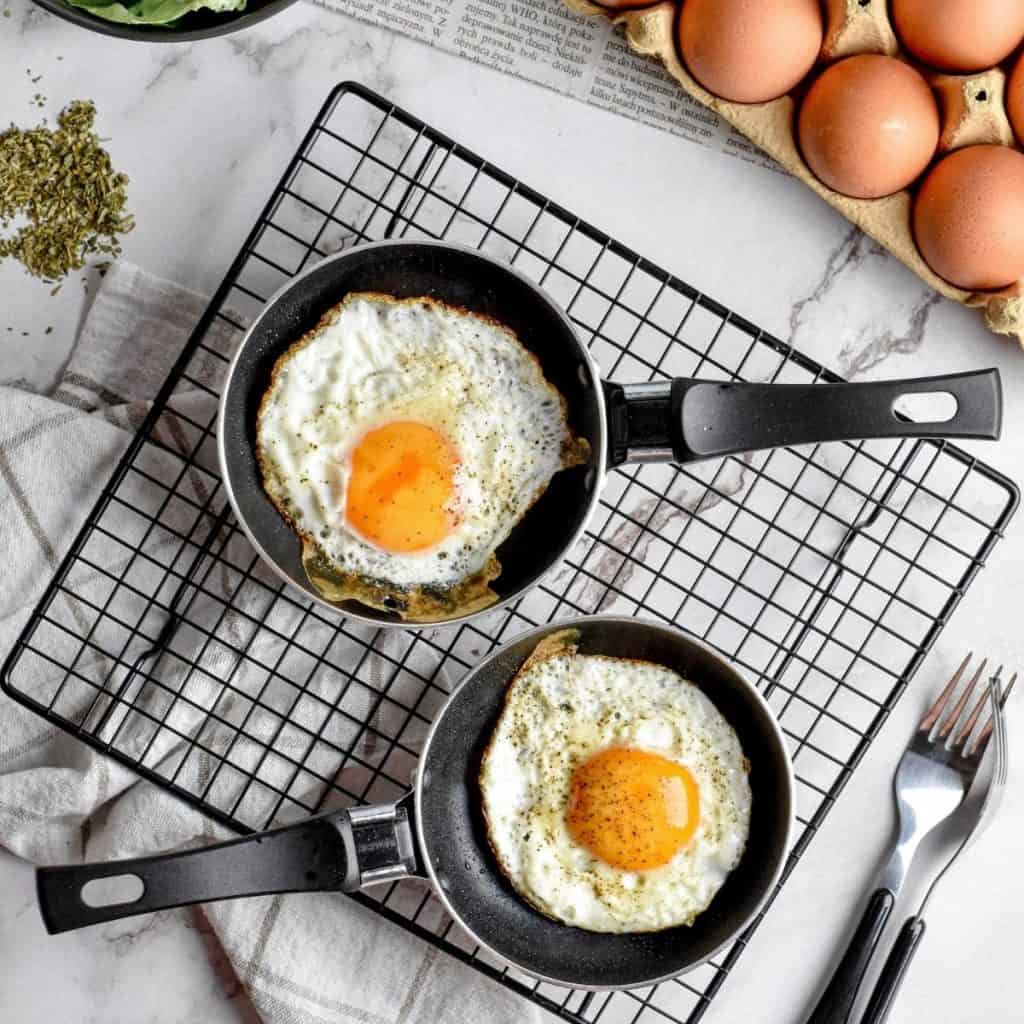 Fried eggs cooked in pans