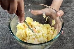 Mash potatoes and egg together