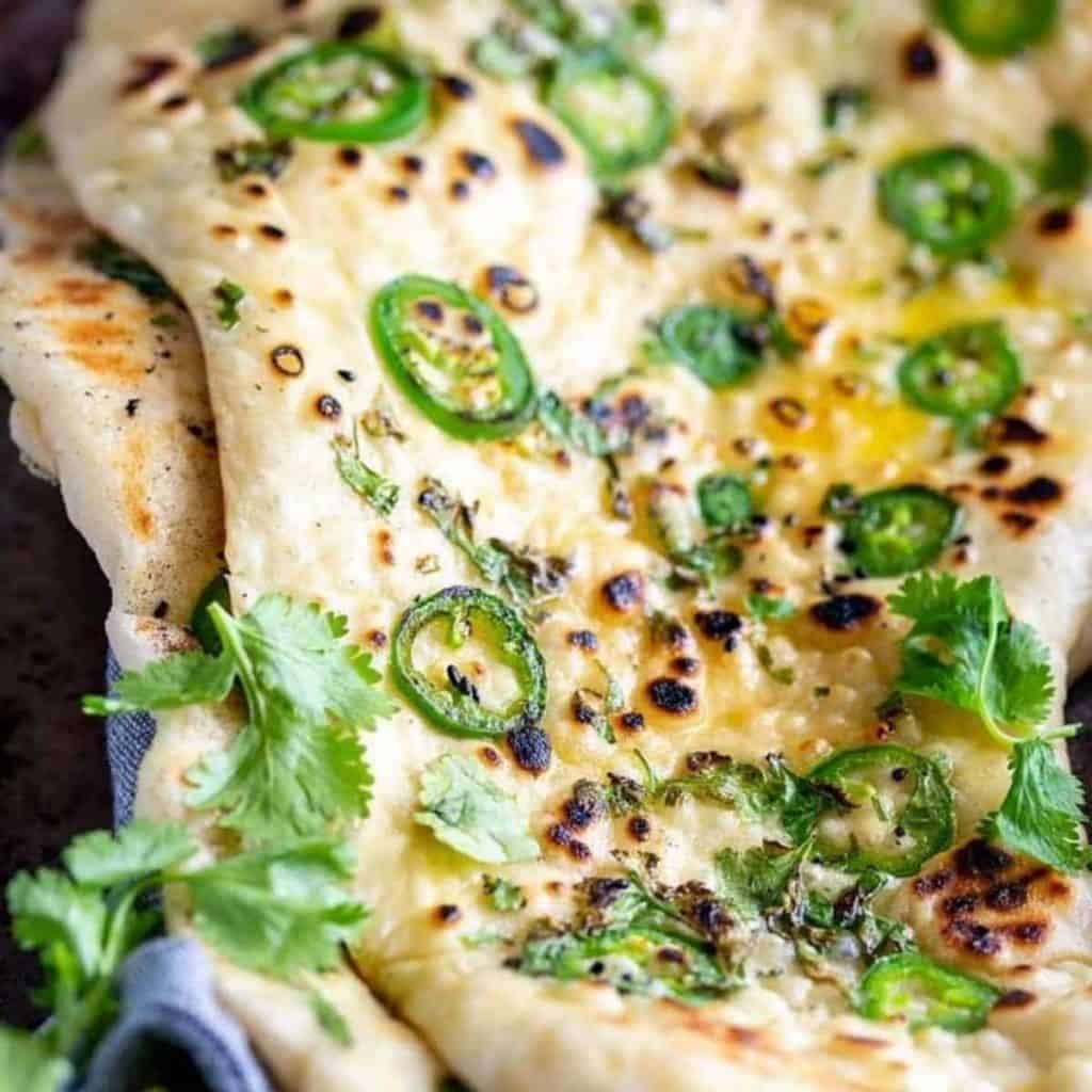 Indian Naan topped with green chili, chaat masala & ghee