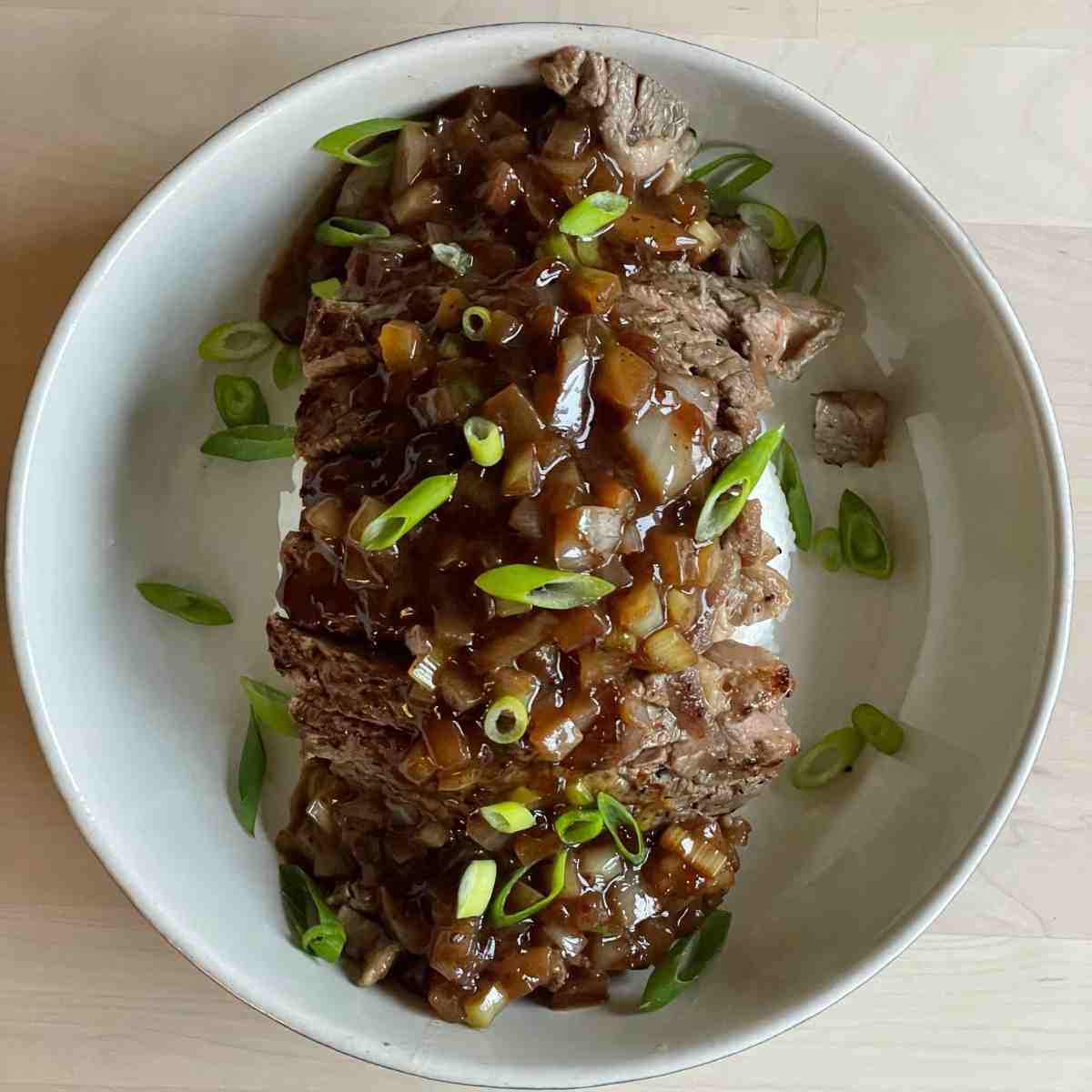 chaliapin steak with spring onions