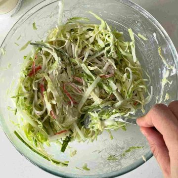 mix mayo into kani cabbage slaw