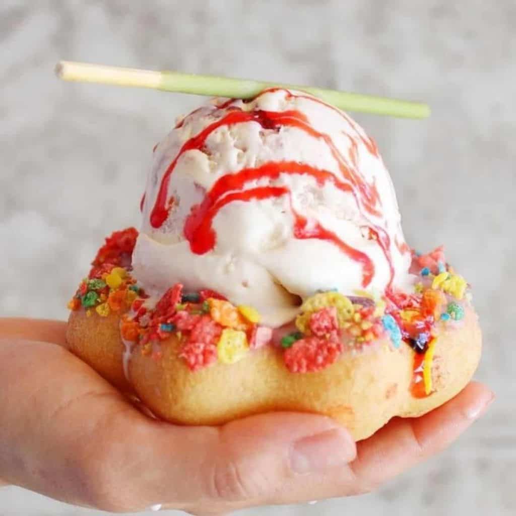 Japanese doughnut topped with one scoop of ice cream