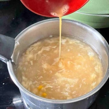 add beaten egg to chicken soup