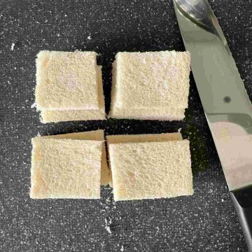 slice white bread into squares