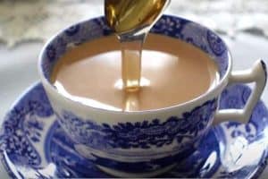 Add honey to the cup of tea before serving