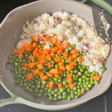 add peas carrots to rice stir fry