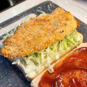 add cabbage and katsu to bread