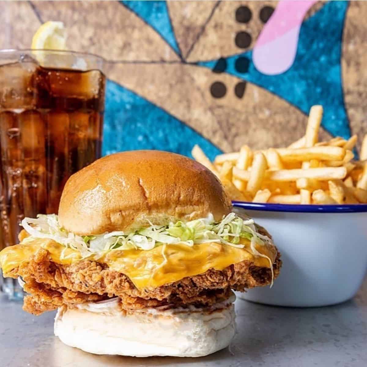 halal burger in london with chicken tenders, with lettuce and melted cheese