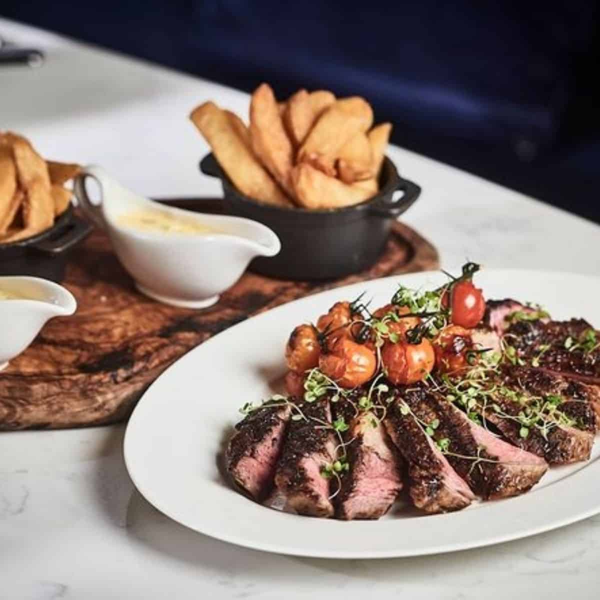 12oz fillet steak with tomatoes and chips