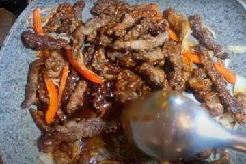 Mix beef with sauce and garnishing