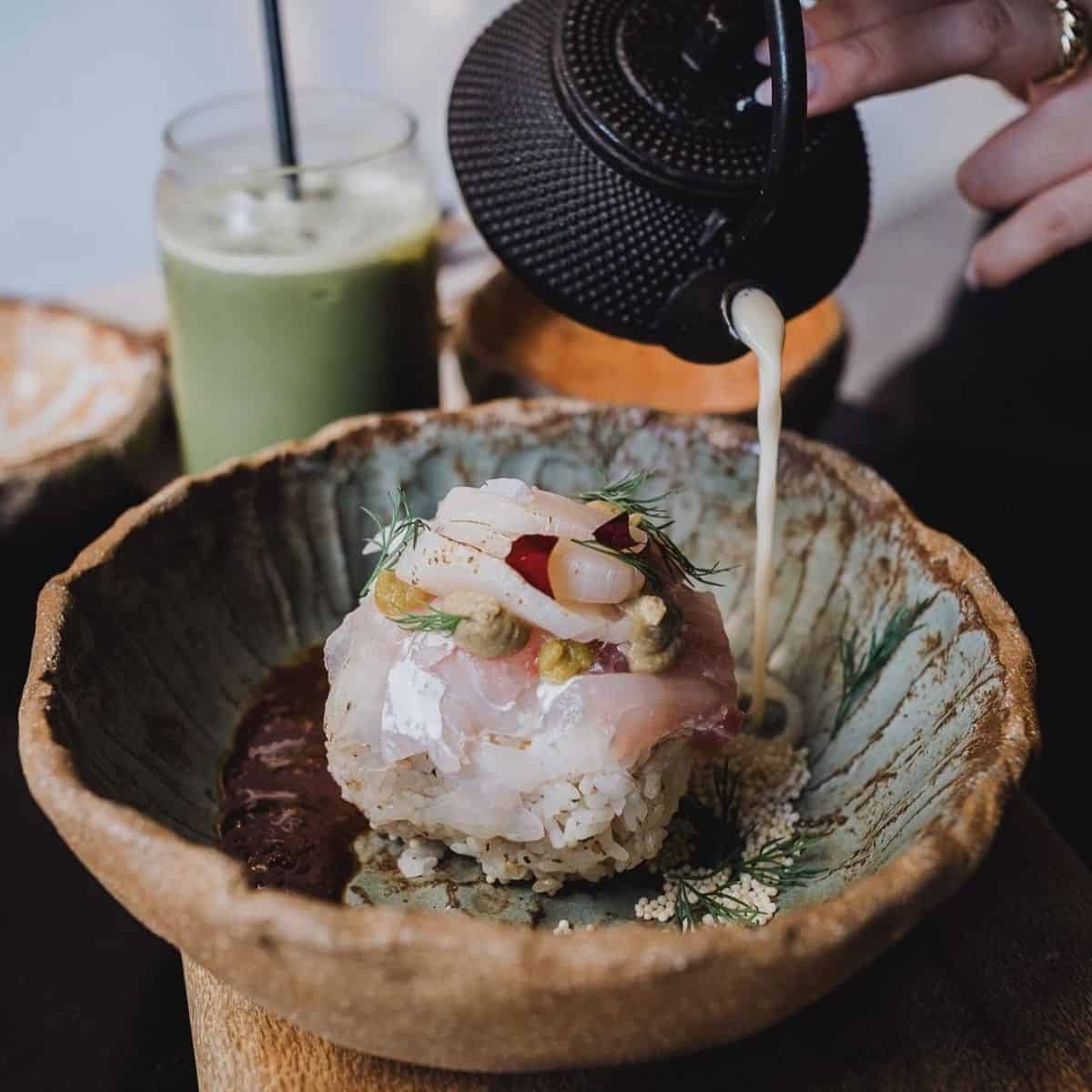 Modern twist Japanese tea over rice bowl