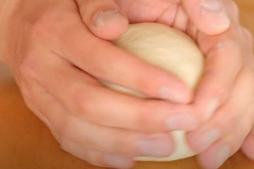 Roll the dough until it becomes a smooth ball