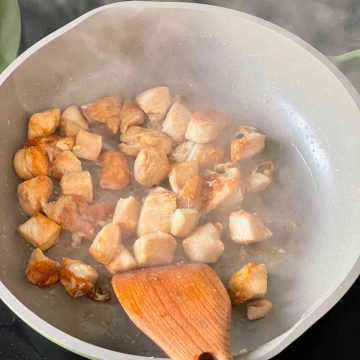 Flip and fry chicken breast cubes