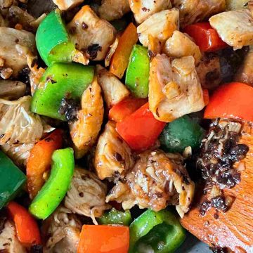 Stir frying chicken and black beans