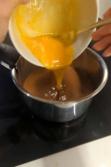 Add yolk mix and cornstarch to milk tea