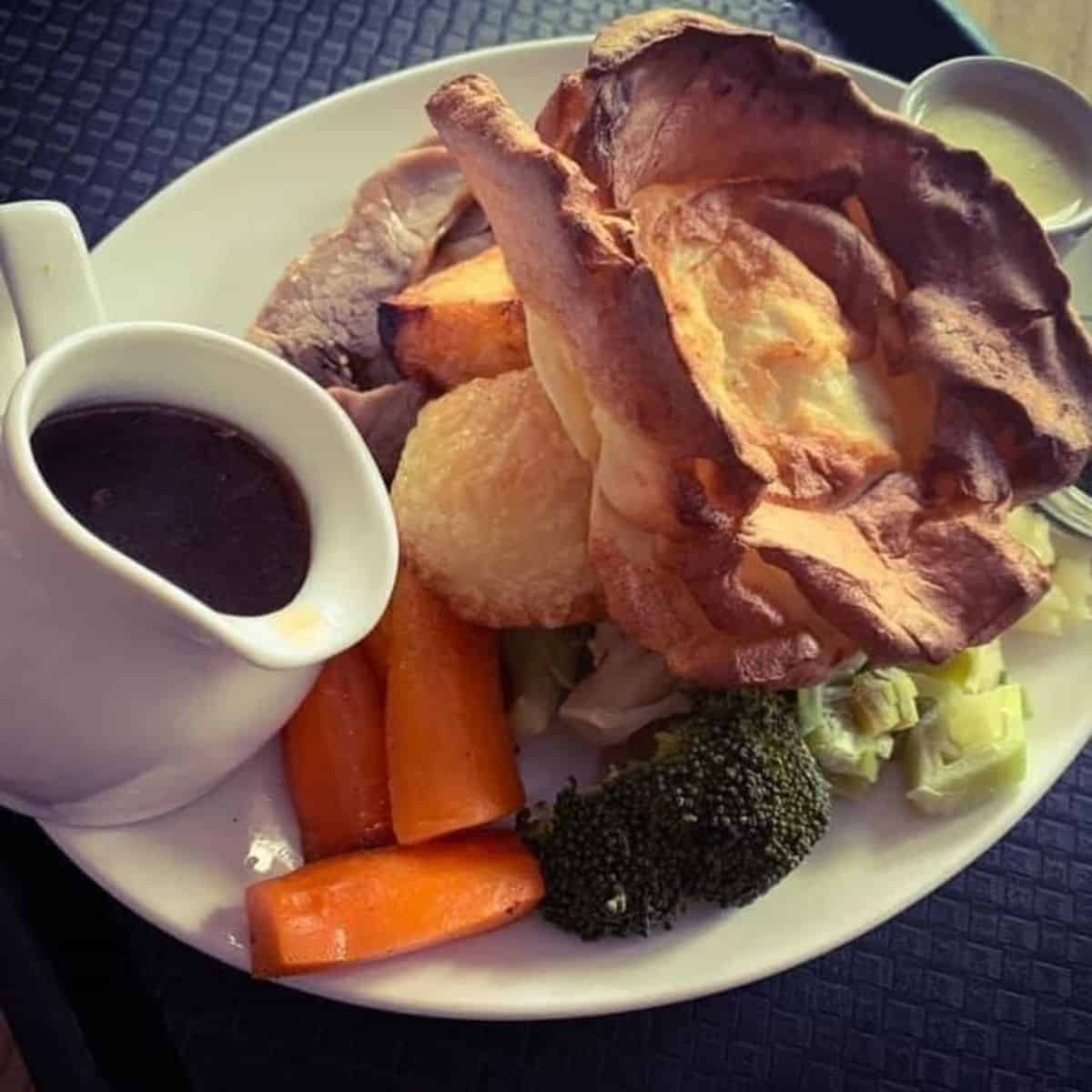 roast dinner with sides and meat in a plate The Marine Tavern cheap eats Brighton