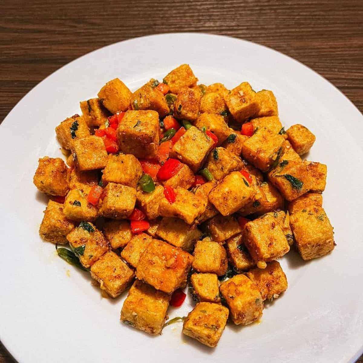 salt and pepper tofu in a plate