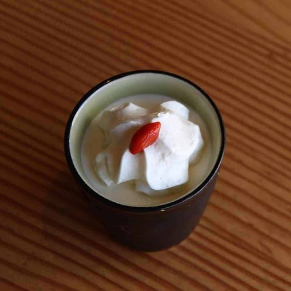 Almond tofu with cream and goji berry