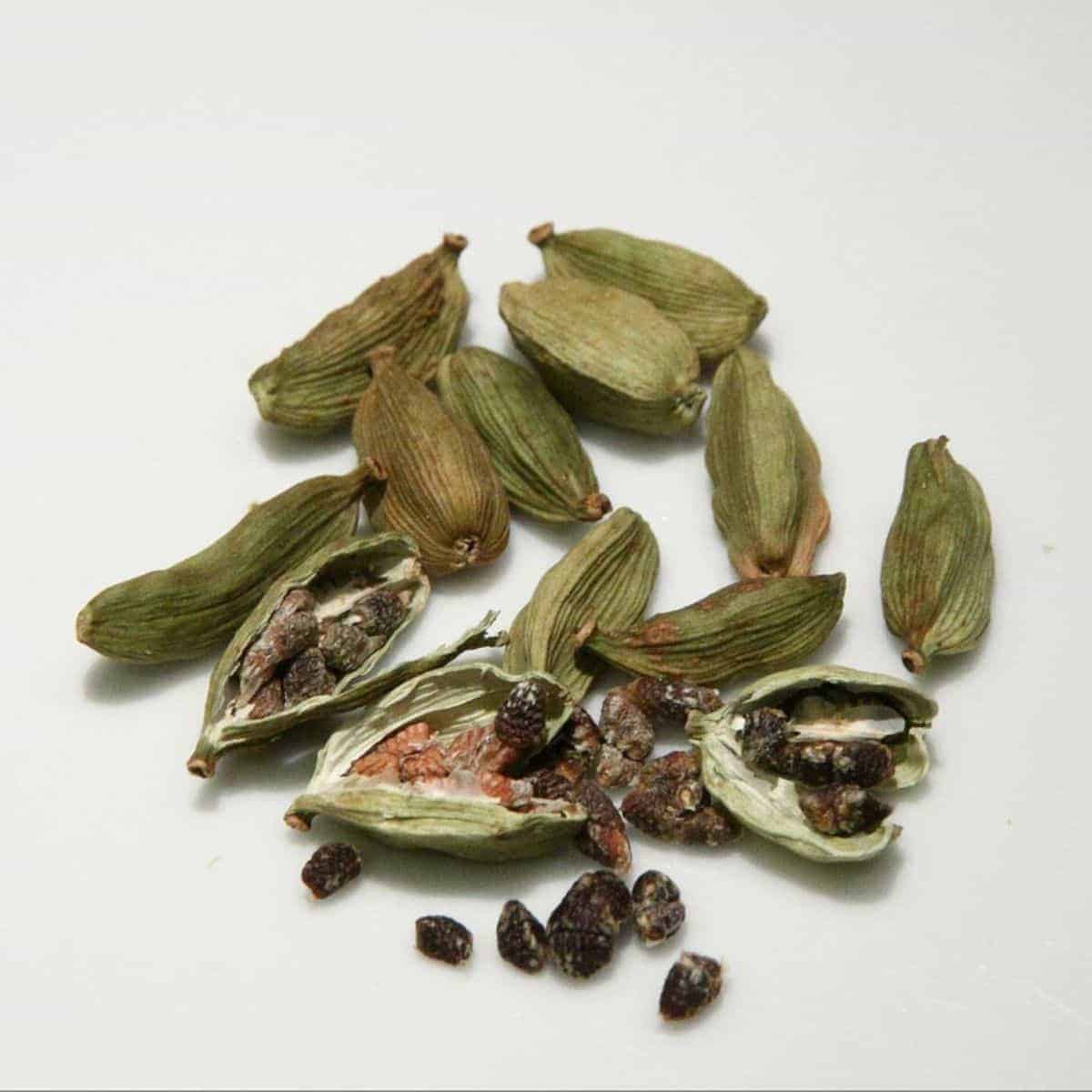 green cardamom pods and seeds