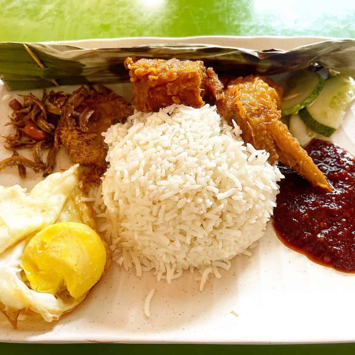 Adam food court famous Selera Rasa Nasi Lemak with anchovies, chicken wings, and egg