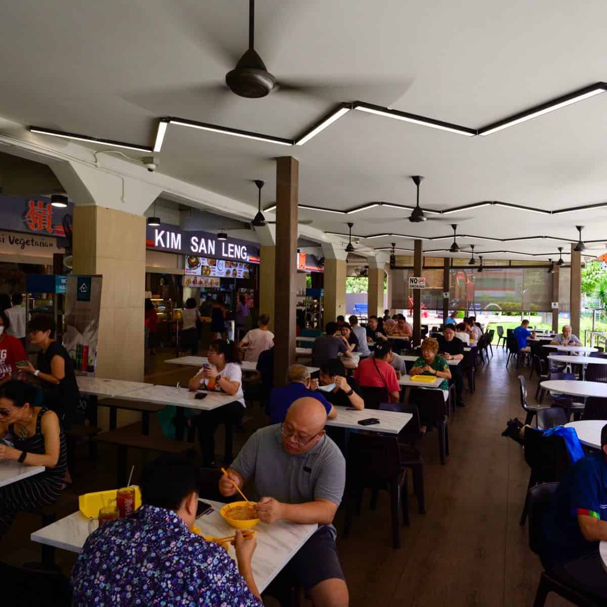Hawker Centre in Singapore Kim San Leng with various customers eating