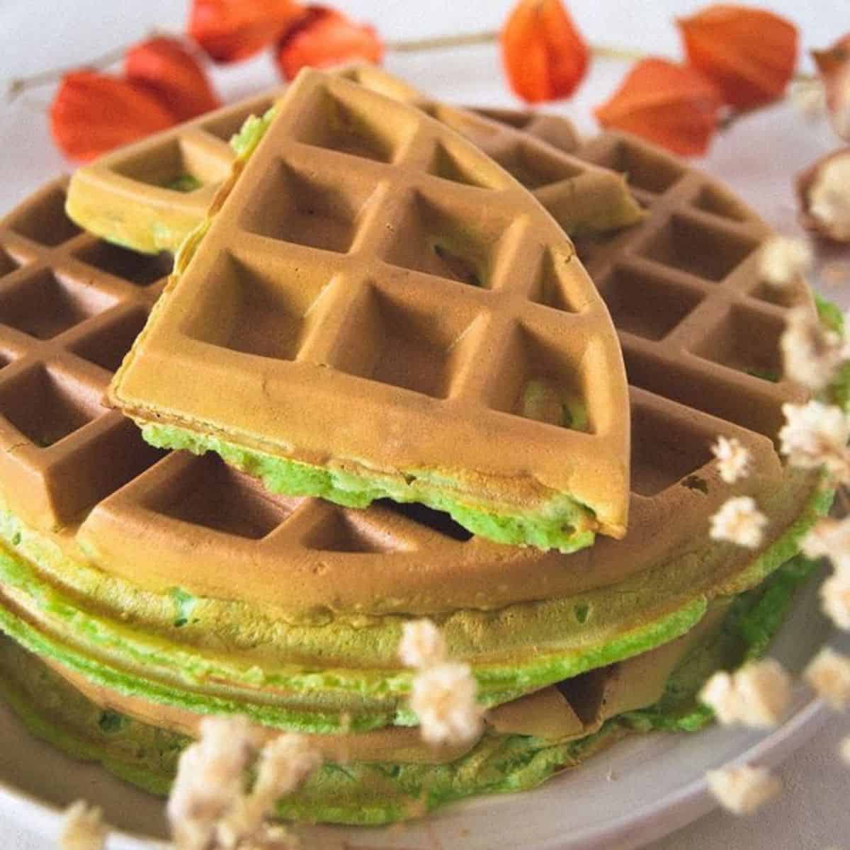 Pandan mochi waffle with flowers on the side