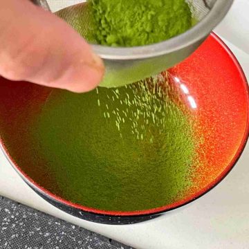 Sift matcha powder in a bowl