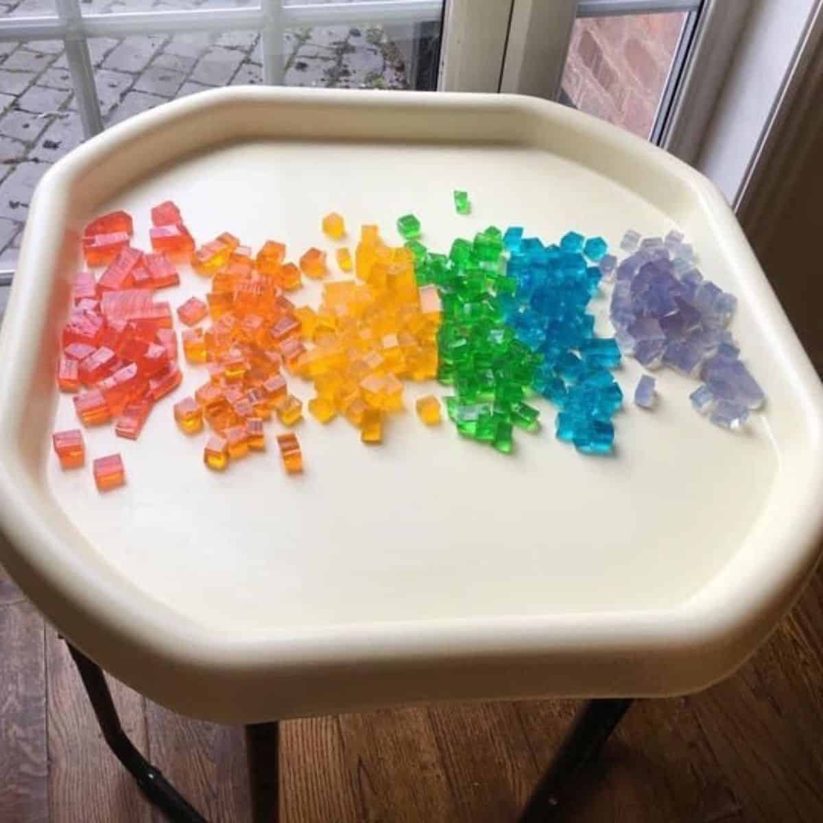 different coloured rainbow jelly topping