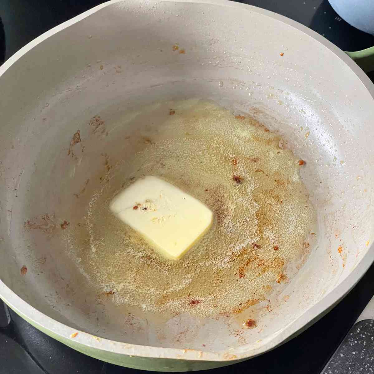Lower heat to melt butter