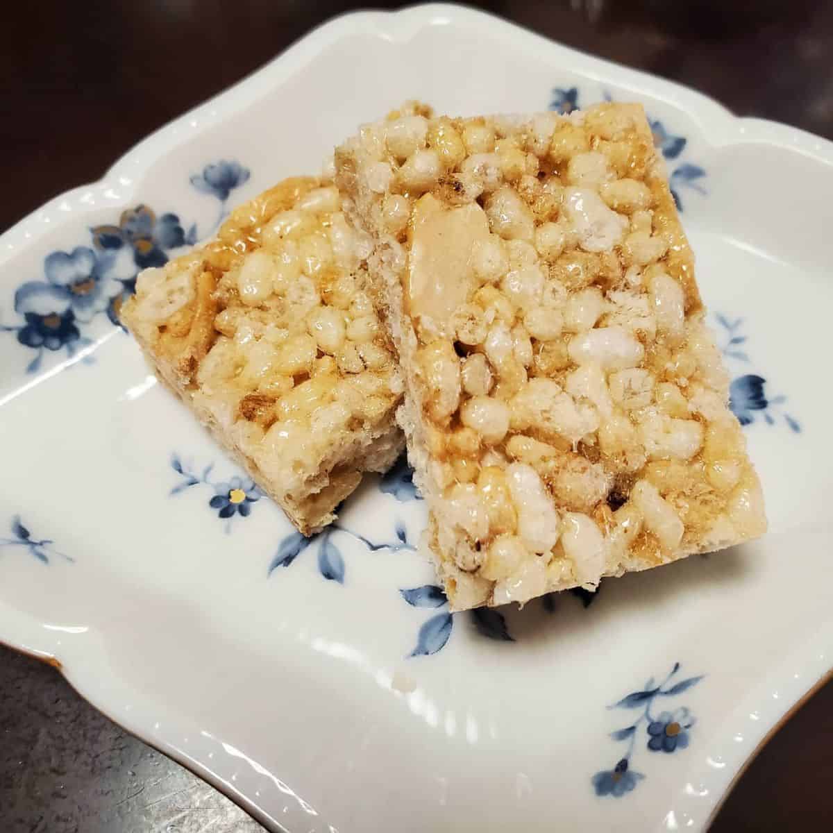 halal Japanese snack Kaminari Okoshi in a floral and square white plate
