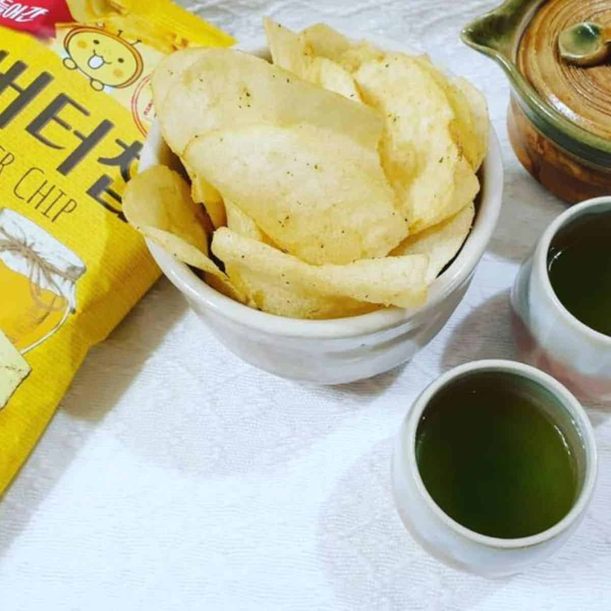 Honey Butter Chips placed in a small bowl paired with matcha tea halal korean snacks
