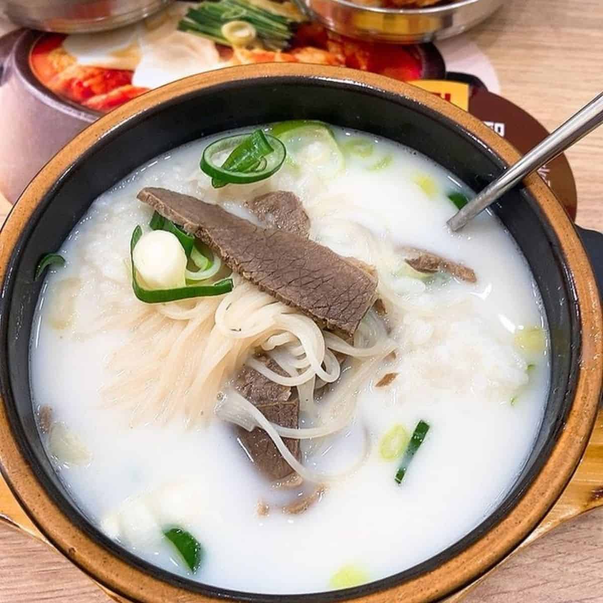 Seolleongtang with a milky white coloured soup