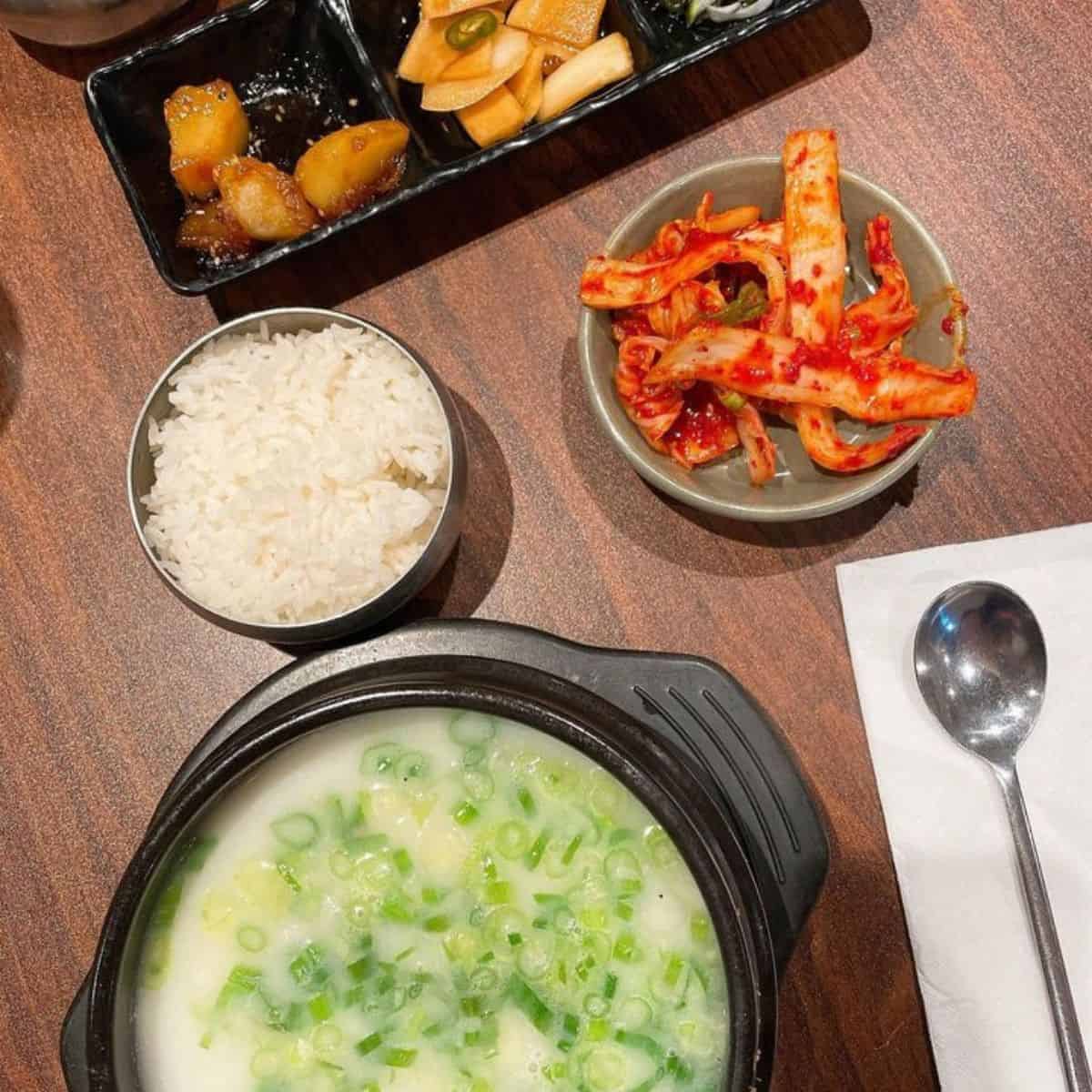 Yummy Seolleongtang with rice, kimchi and other Korean side dishes