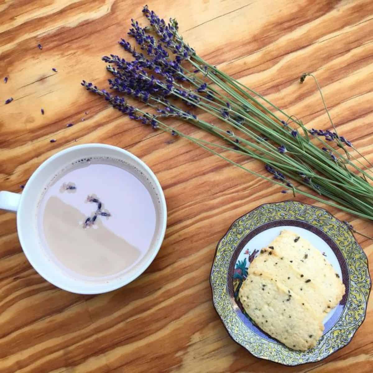 Fresh lavenders, golden brown cookies, and a hot cup of lavender drink