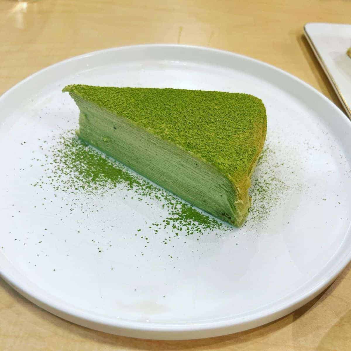 A refreshing dessert topped with green powder for a nicer finish