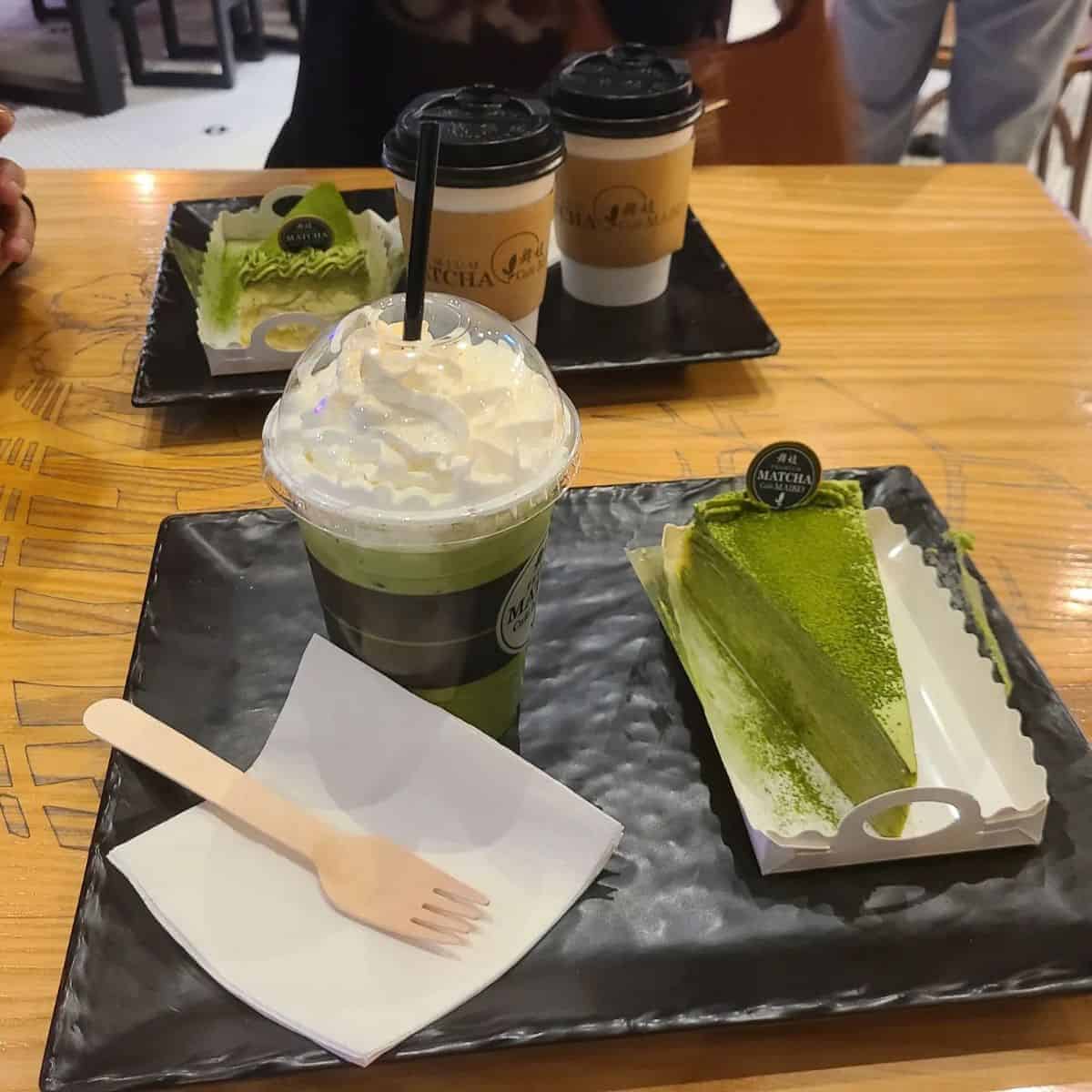A delicious combination of healthy snacks in green colour inside a cafe