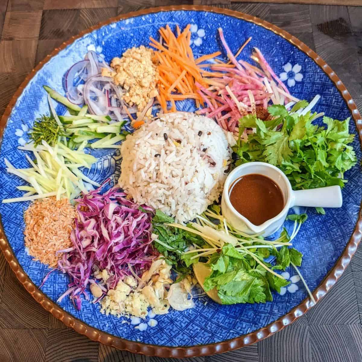 Thailand-style nasi kerabu dish khao yam