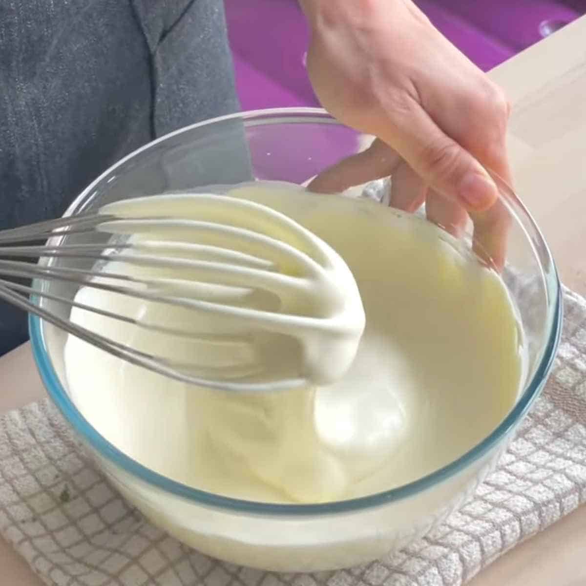 Whipping cream with a hand held whisk