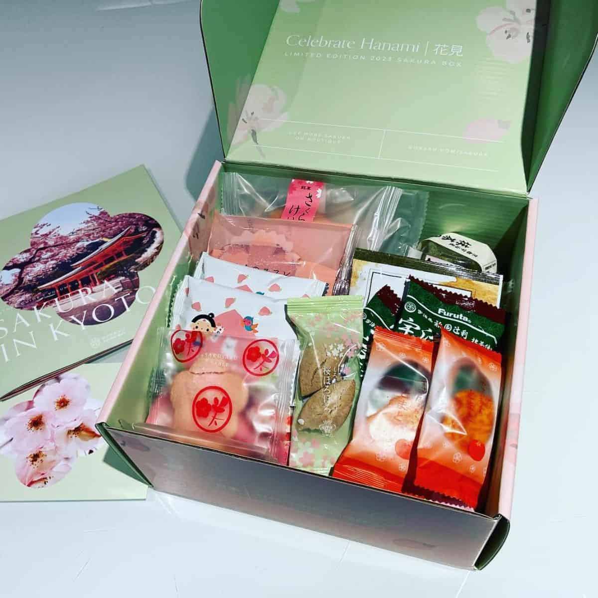 Bokksu in a green themed box filled with sweet treats