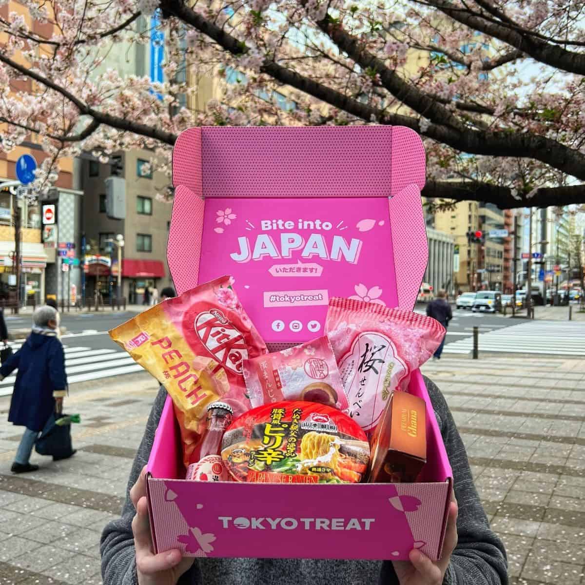 Tokyo Treat in a pink box under the cherry blossom tree