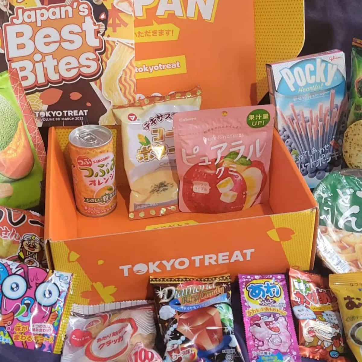 Japanese candies and chocolates inside and around an orange storage