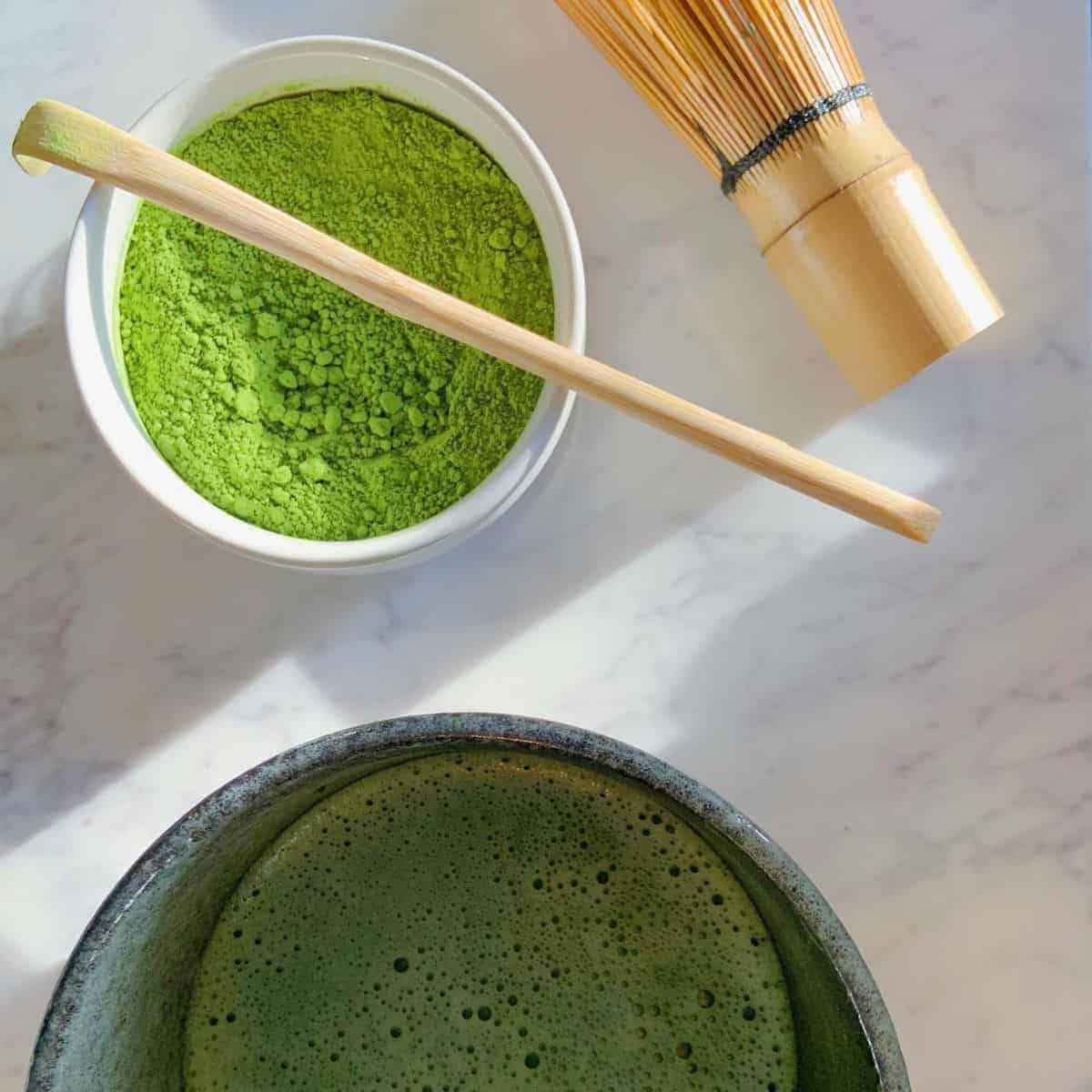 green tea products on top of a marble table