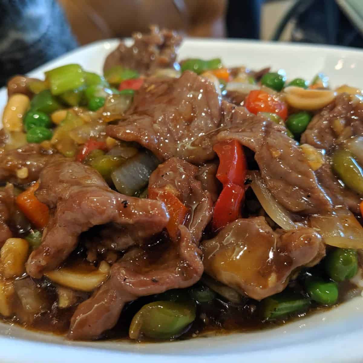 Savoury Kung Pao Beef serving with sticky sauce