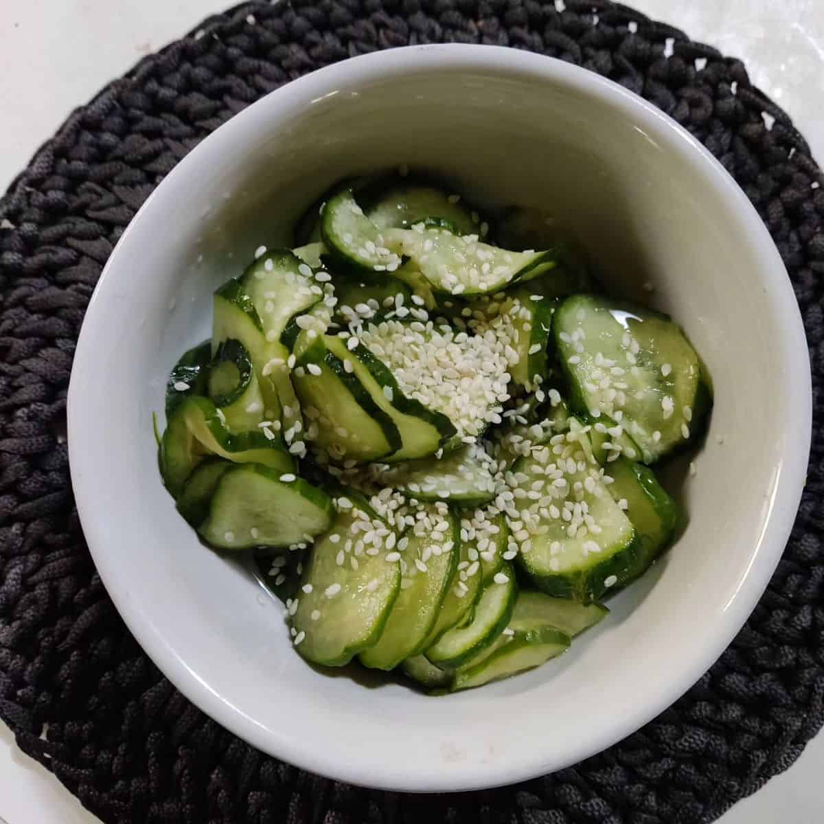 One delicious serving of Japanese cucumber salad with sesame seeds